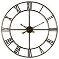 Front view of an open circular wall clock against white, with antique-brass-toned rings, Roman-numeral bars, four spokes and ornate pointed hands with looped ends.