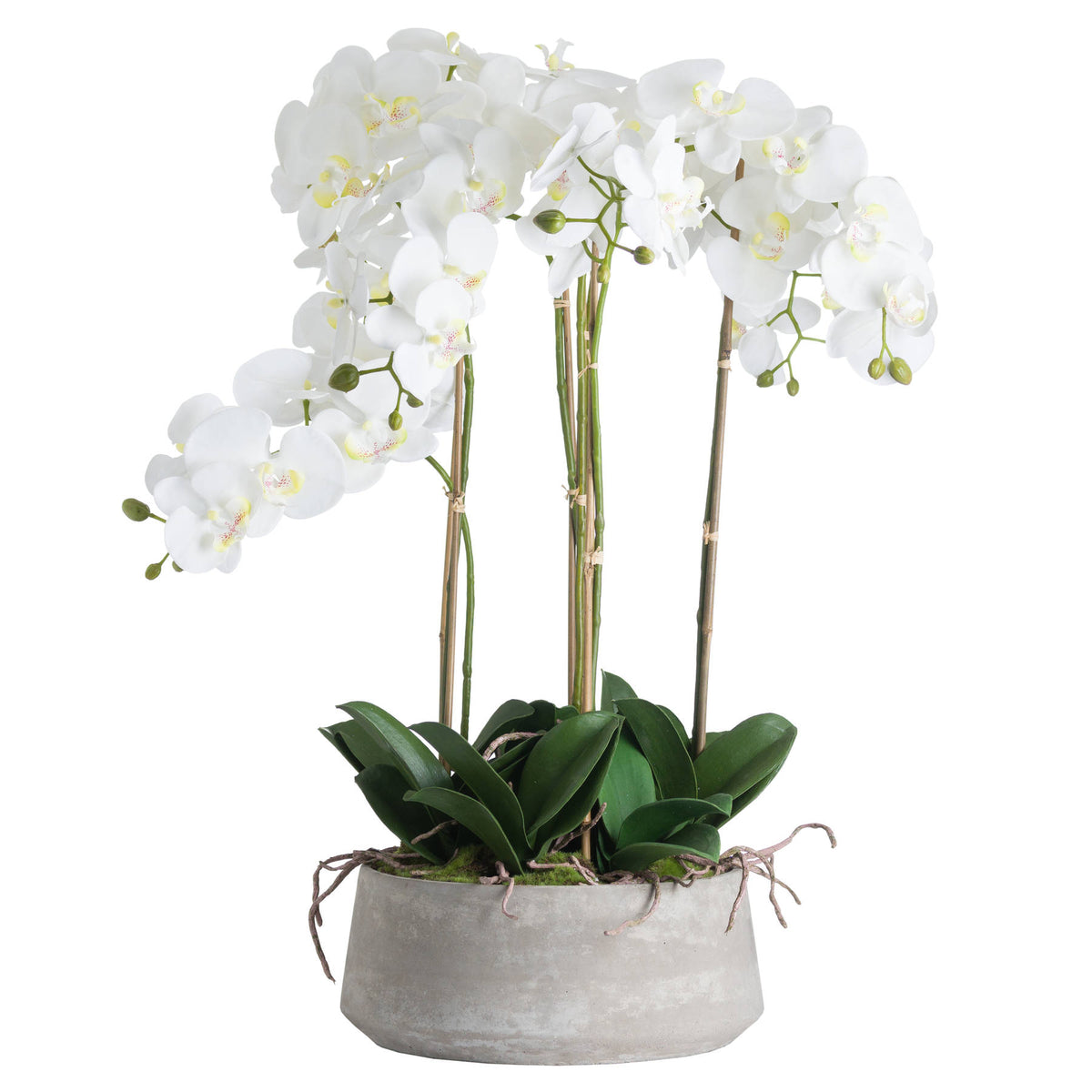 White artificial flower arrangement with arching sprays, green leaves and visible support canes in a low grey oval pot, against a white background.