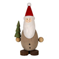 Front view of oval brown Santa with a long white beard, tall red hat and green tiered tree dotted with red.