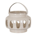 Glossy cream lantern with tall oval cut-outs, a wide open rim and a pale strap-like handle arched above the rounded body, shown against white.