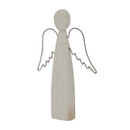 Angled view of the pale angel decoration showing the depth of its tapered body, brown surface markings and curved outline wings.