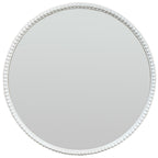Front view of a round mirror with a narrow pale border of raised beads.