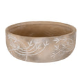 Shallow round taupe planter with white leafy branches across the mottled exterior, a thick rim and an open brown interior.