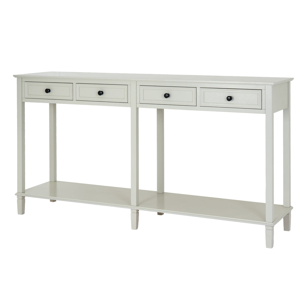 Angled view of an off-white console table with four framed drawers, dark round knobs and a full-width open lower shelf.