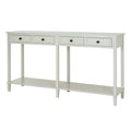 Angled view of an off-white console table with four framed drawers, dark round knobs and a full-width open lower shelf.