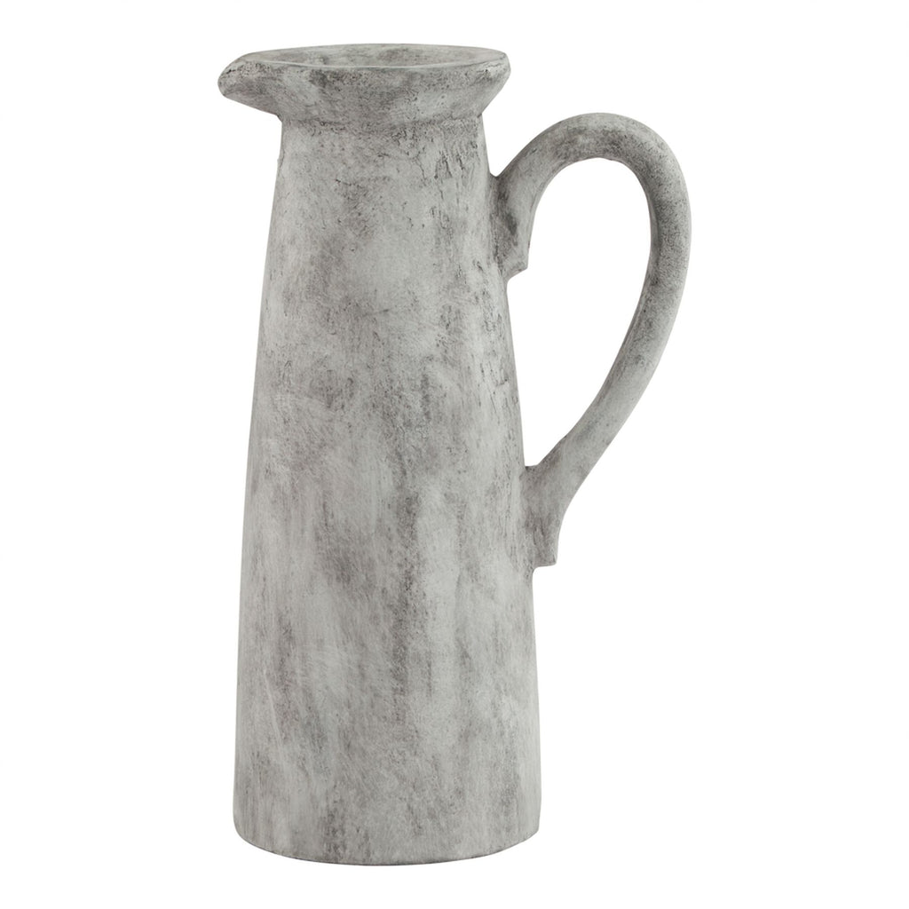 Pale grey-white decorative jug with a tall tapered body, flared spout and long curved handle against a white background.