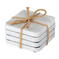 Four pale square coasters stacked and tied with brown twine, showing rounded corners, rough edges and small black underside pads.