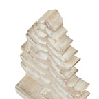 Angled close-up of the tree's upper tiers, showing stepped sides and lighter curved recesses in the pale surface.