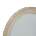 Close-up of the mirror's curved frame showing grain-like lines, segmented joins and moulded inner and outer edges.