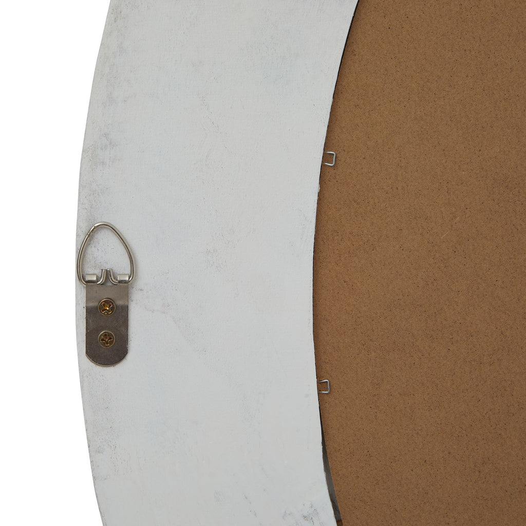 Rear detail of the mirror showing a silver-coloured hanging ring on the pale frame beside a brown backing panel.