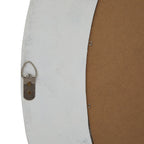 Rear detail of the mirror showing a silver-coloured hanging ring on the pale frame beside a brown backing panel.
