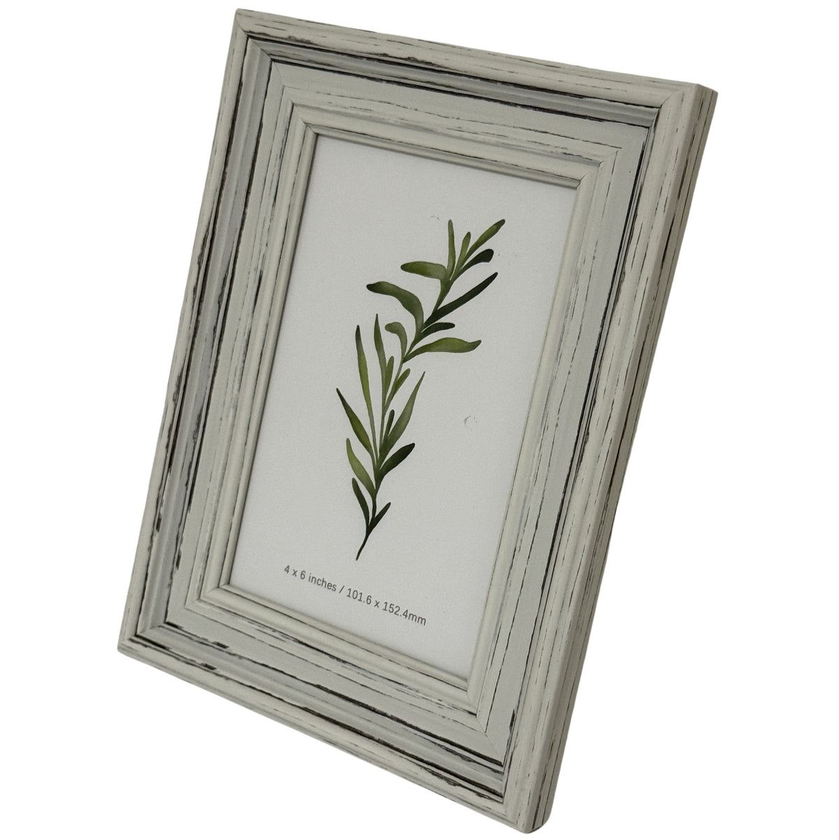 Angled front view of the pale layered photo frame, showing the depth of its right edge and a green leafy insert.