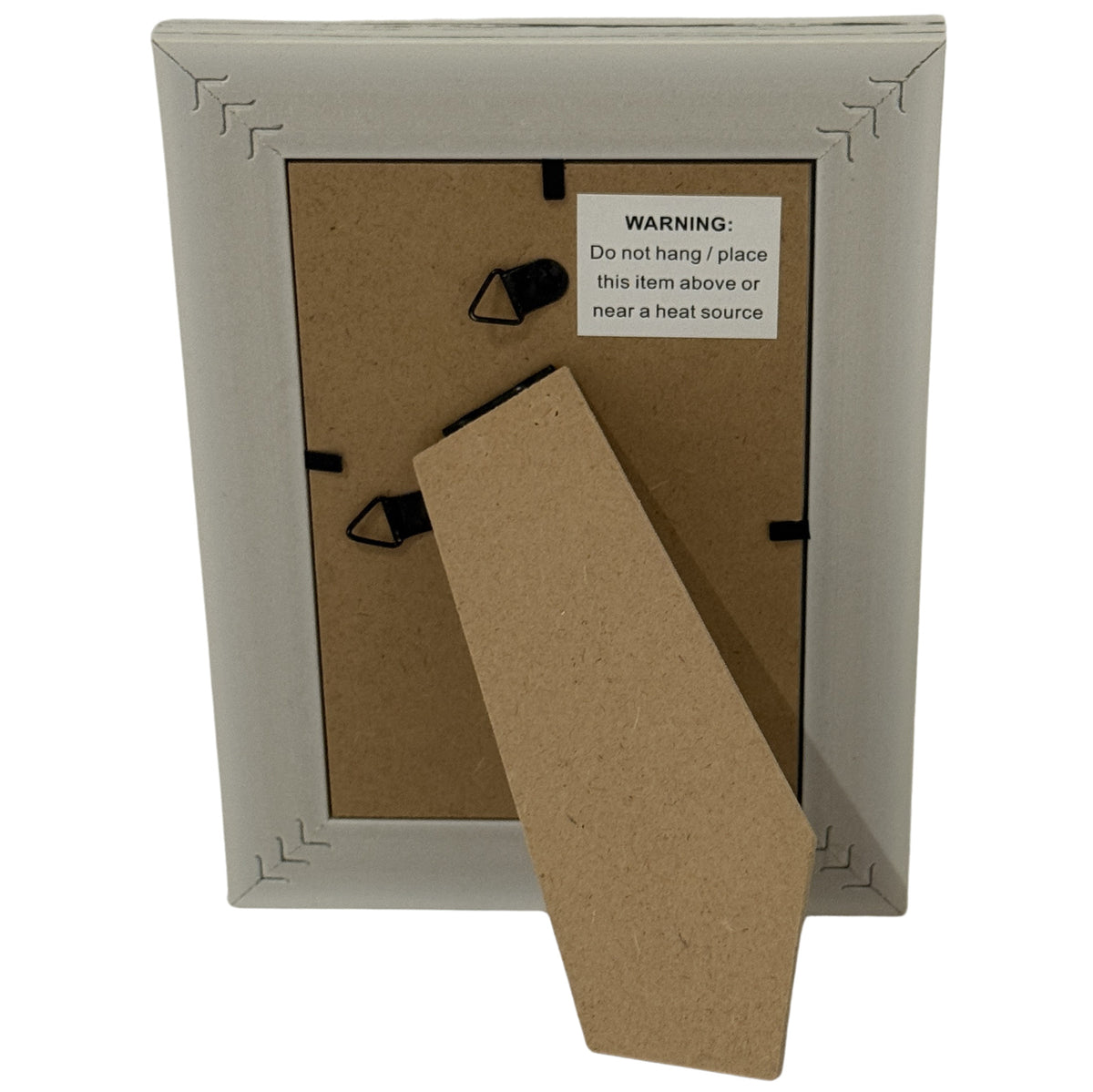 Rear view of the photo frame with a fold-out stand, two hanging loops and a label warning against placement above or near a heat source.