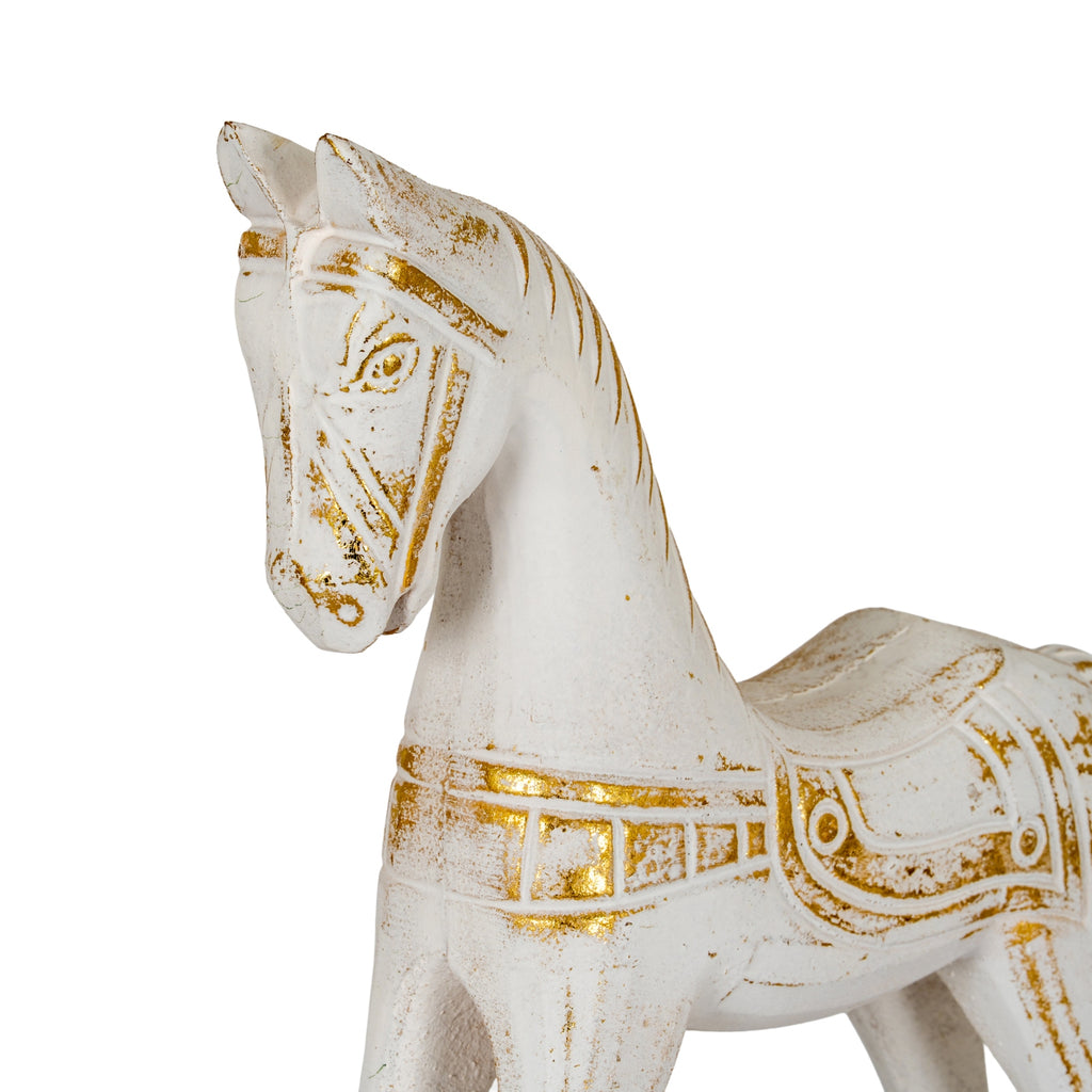 Close-up of the horse's head, neck and saddle, with irregular gold-coloured accents outlining the eye, bridle and mane.