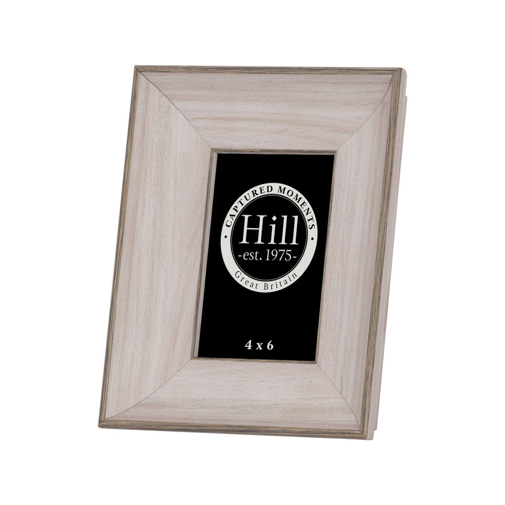 Angled front view of a portrait photo frame with a broad pale wood-effect border, darker stepped edging and a black display insert.