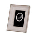Angled front view of a portrait photo frame with a broad stepped pale white-grey wood-effect border and black display insert.