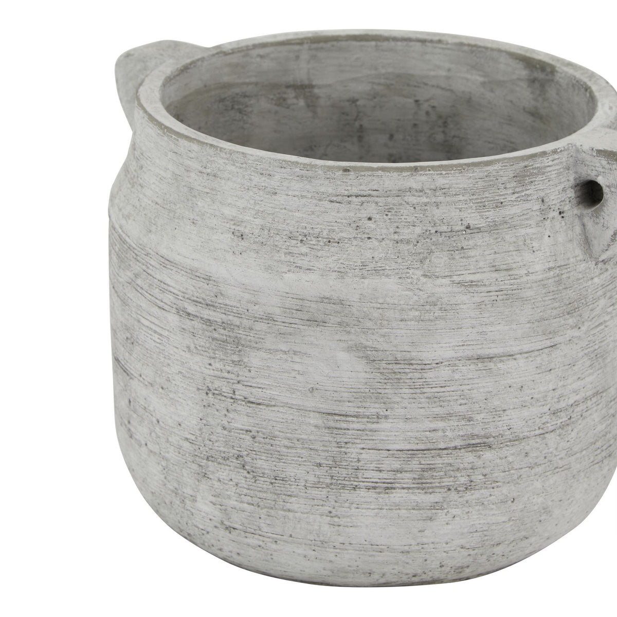 Angled close view of the vase showing its wide rim, grey interior and fine horizontal markings across the pale exterior.