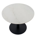 Coffee table viewed from above at an angle, showing fine warm-toned veining across the pale circular top and the dark base below.