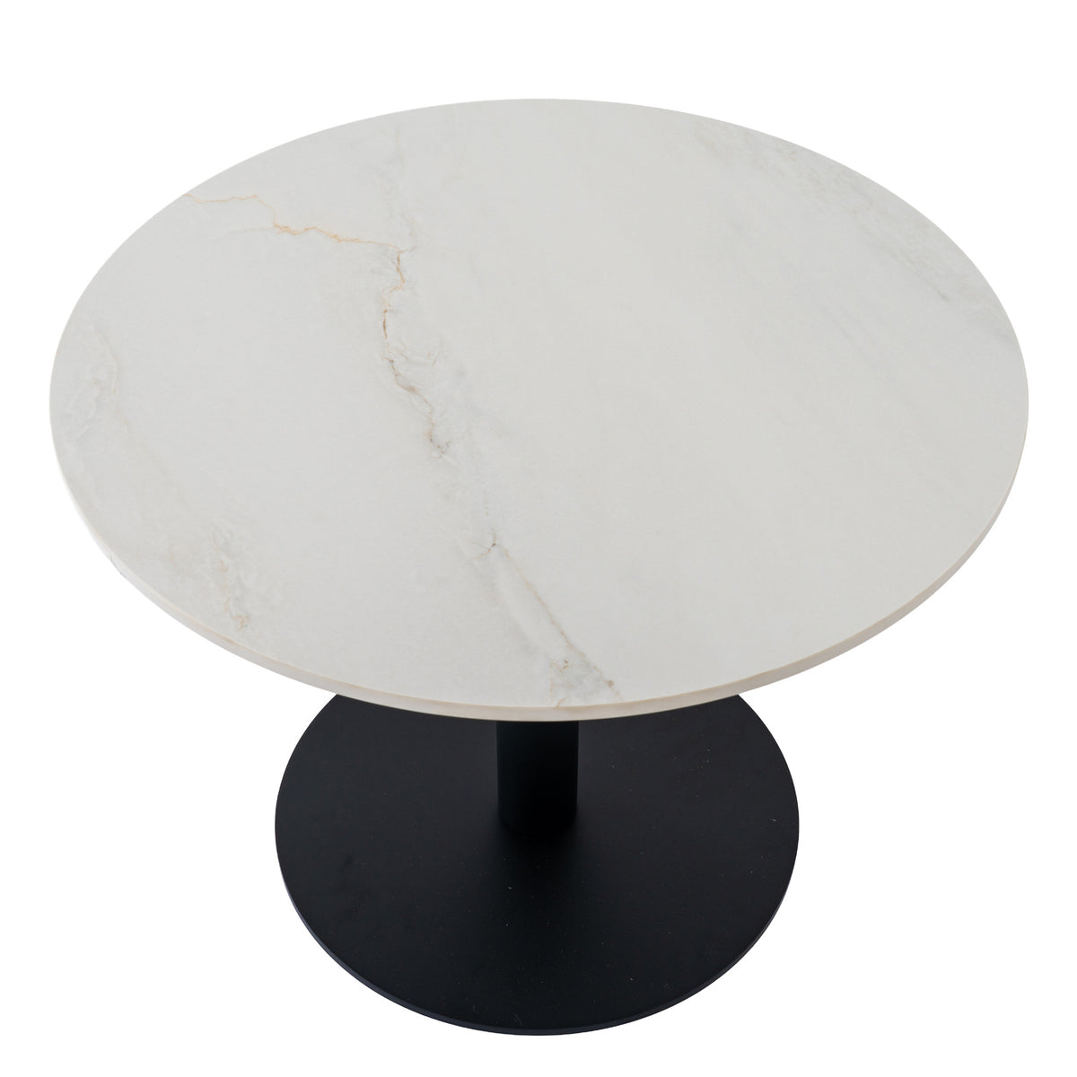 Coffee table viewed from above at an angle, showing fine warm-toned veining across the pale circular top and the dark base below.