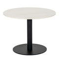 Round coffee table viewed from the front, with a pale veined top above a dark cylindrical pedestal and circular base.