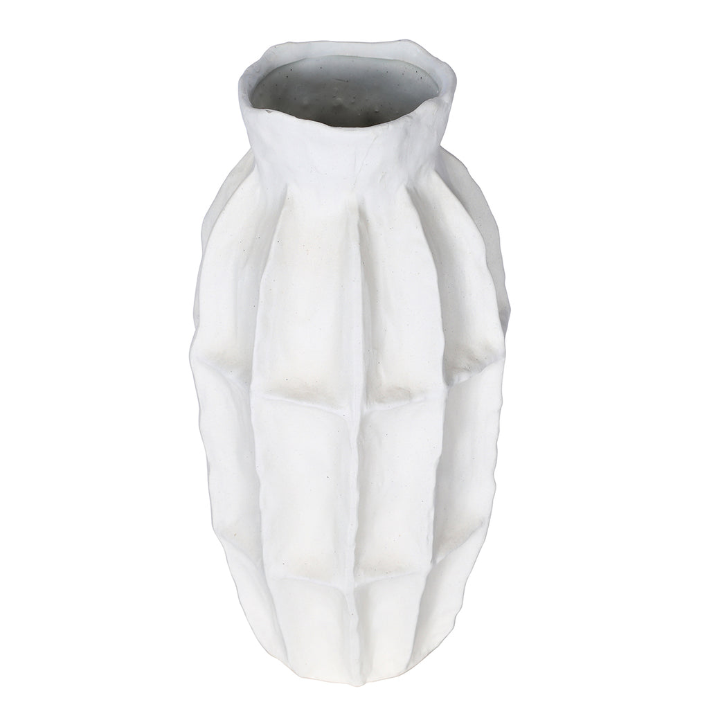 White panelled vase viewed from a raised angle, showing the open neck and gently irregular outline.