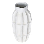 White panelled vase viewed from a raised angle, showing the open neck and gently irregular outline.