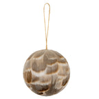 Round feather-look bauble with overlapping taupe, grey-brown and cream patterning and a long brown cord loop against white.