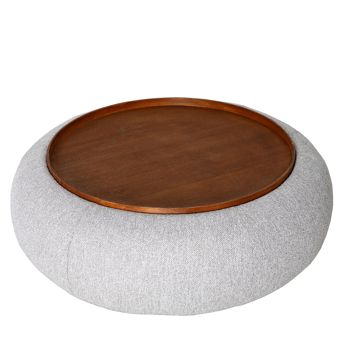 Elevated view showing the circular tray, shallow rim and rounded upholstered surround.