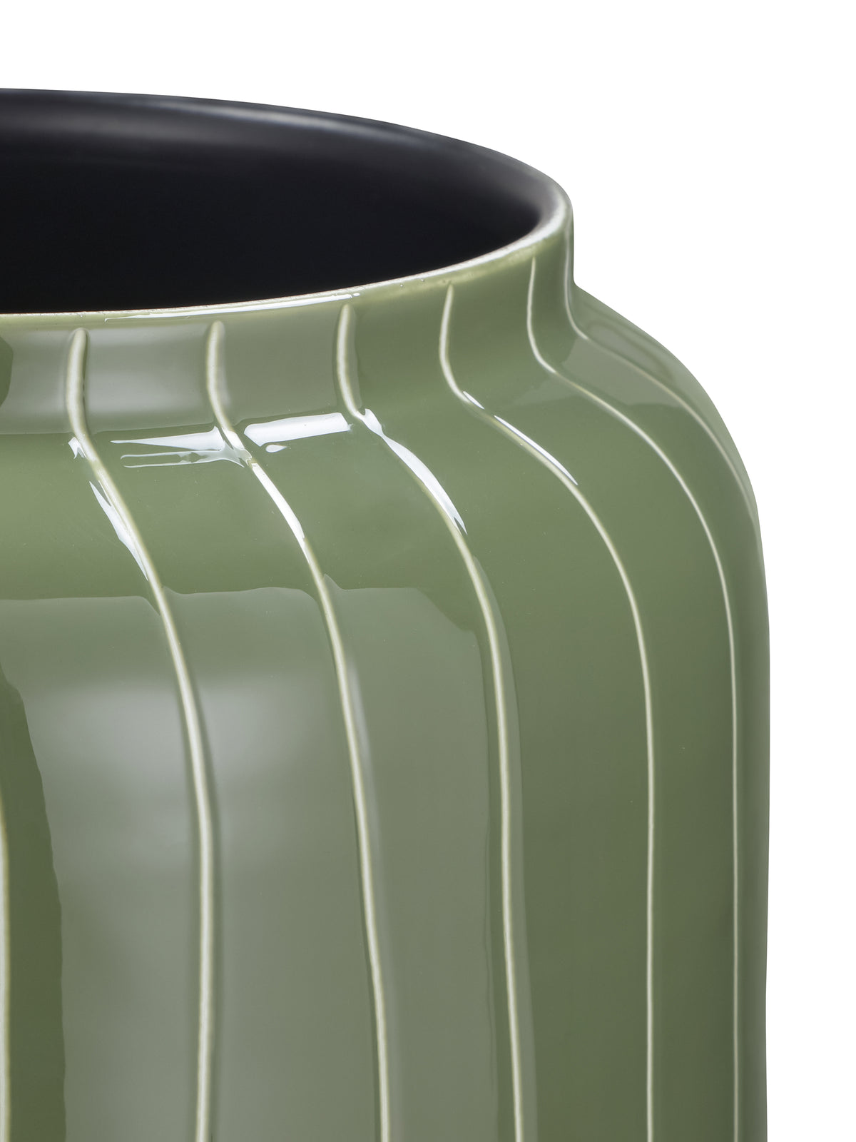 Close-up of the open rim and shoulder, with pale pinstripes curving across glossy green enamel.