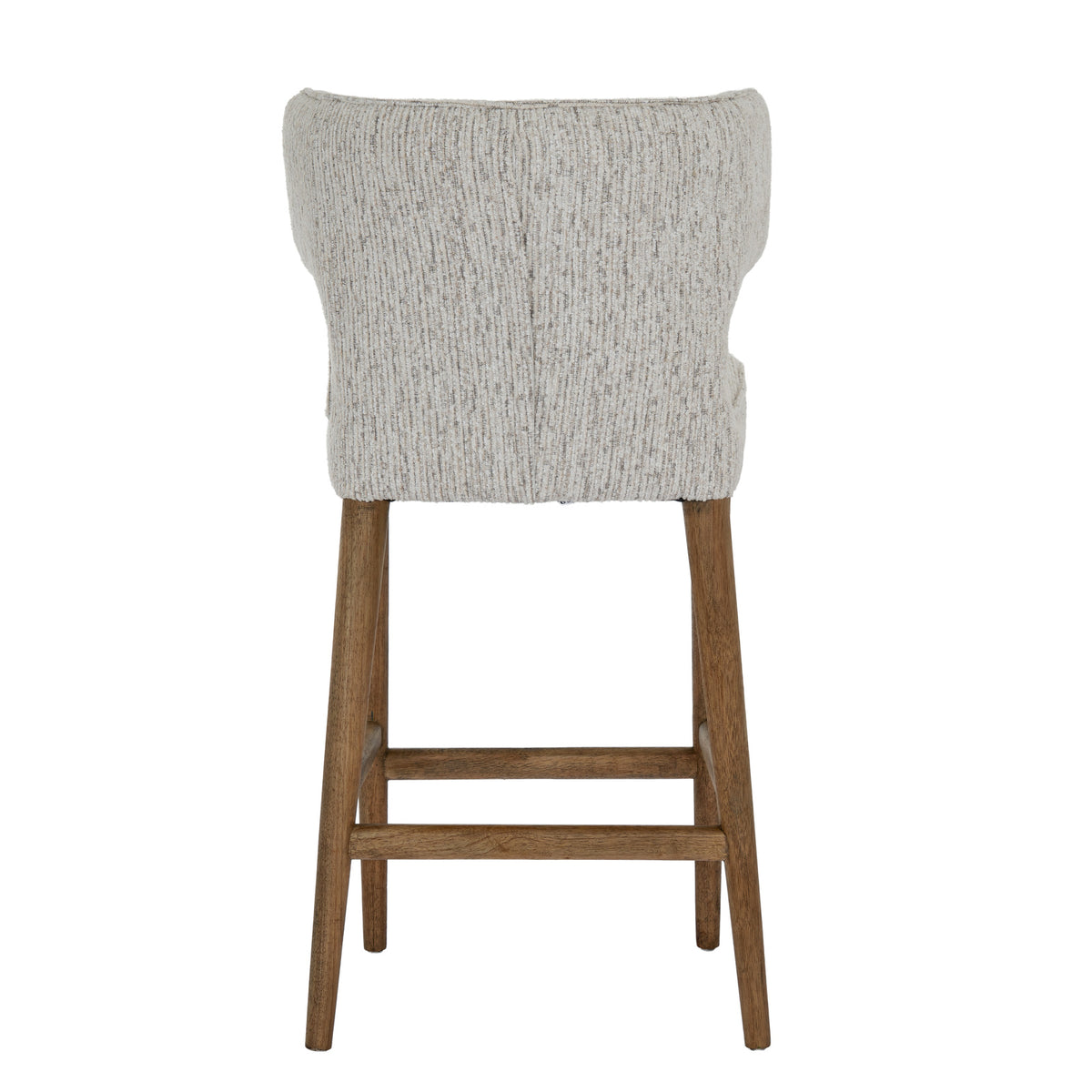 Rear view of the bar stool with a broad curved upholstered back, central seam and warm-brown legs joined by horizontal stretchers.