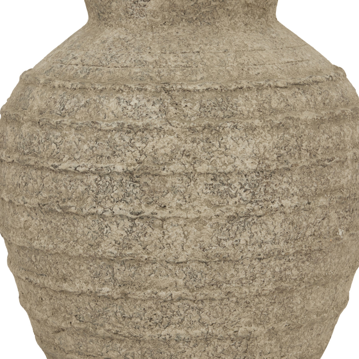 Close-up of the vase's coarse pitted surface, pale beige mottling and irregular raised bands.
