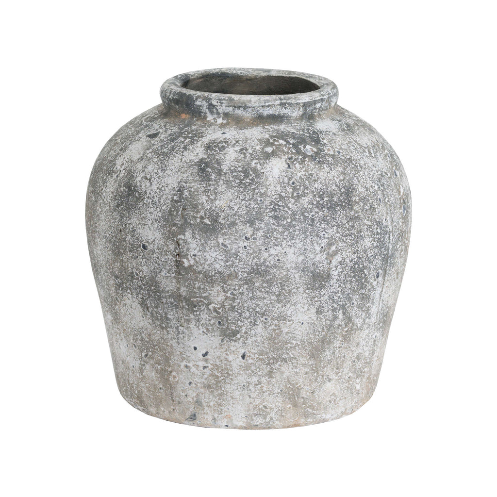 Pitted Round Vase on a white background, showing rounded shoulders, a thick rim and mottled grey-white surface.