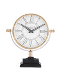 Front view of a mantel clock with black hands and Roman numerals on an ivory dial, a gold-tone surround, curved silver-coloured frame and stepped black base.