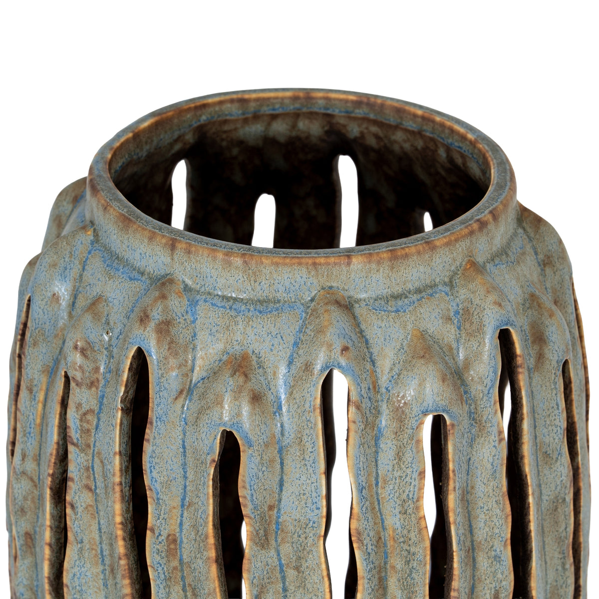 View down into the candle lantern's open circular top, showing the brown-edged rim, dark interior and upper ends of the pointed-arch openings.