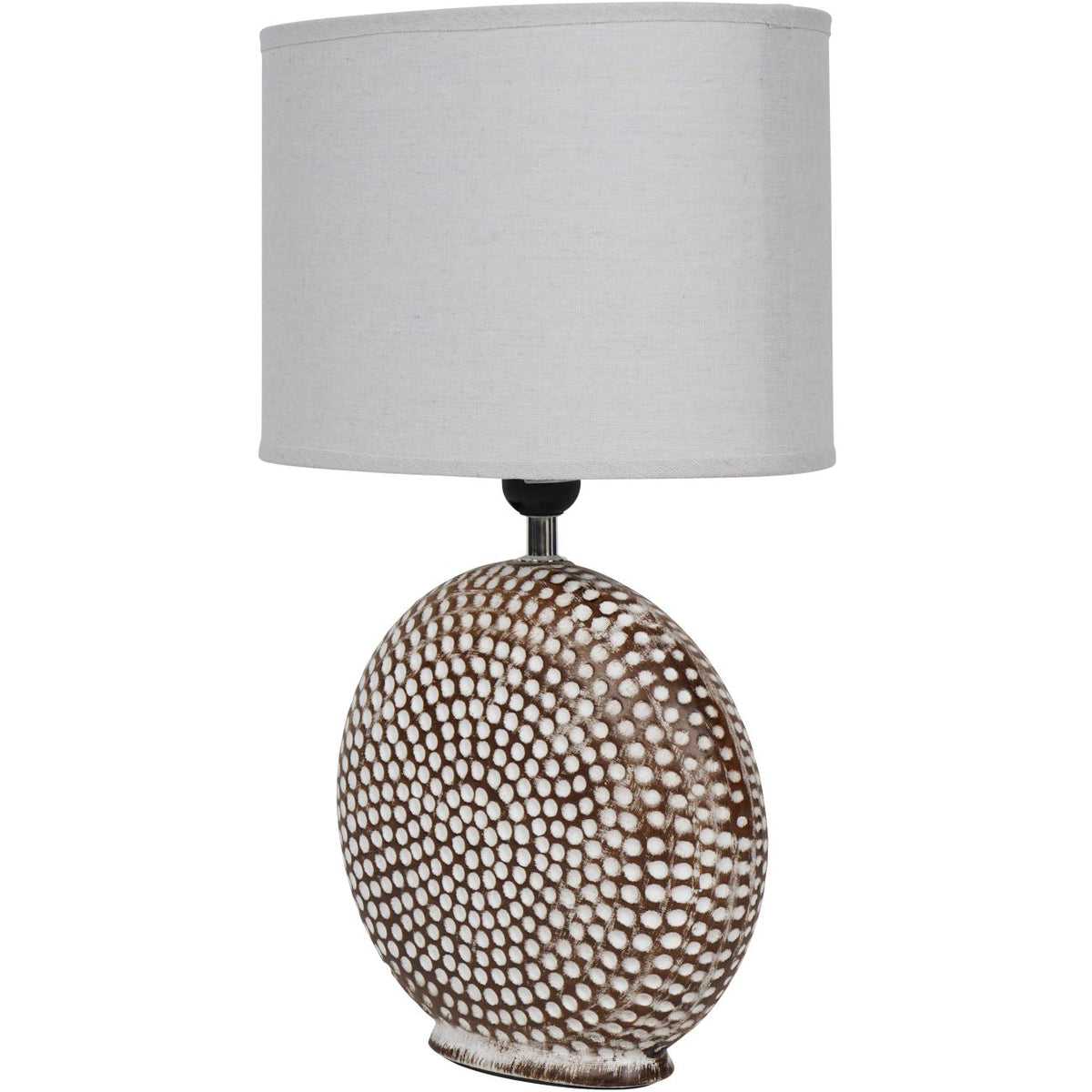 Angled view showing the lamp's flattened ceramic base, curved edges and oval drum shade.