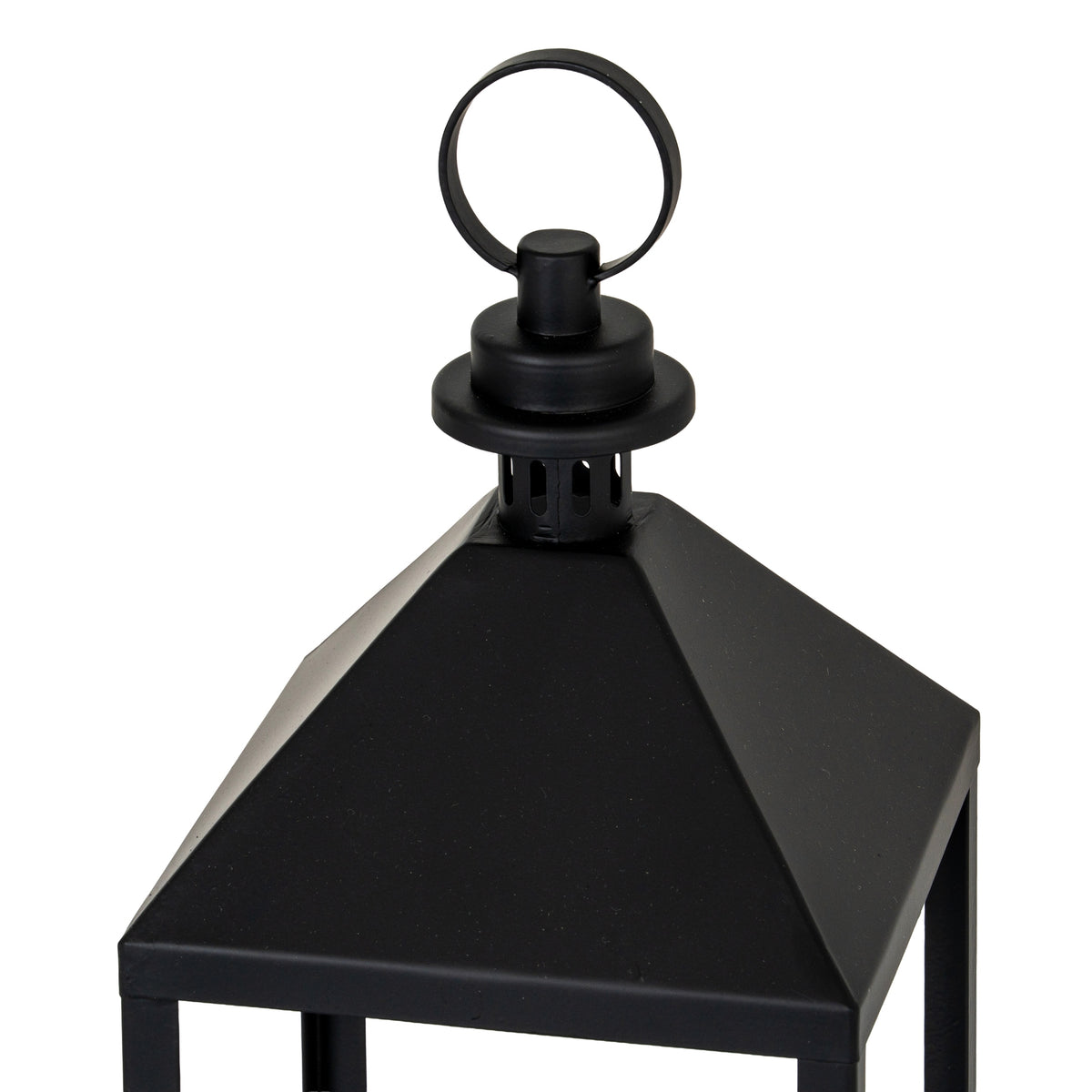 Close view of the lantern's black pyramidal roof, showing the slotted cylindrical cap, stepped circular top and round loop ring.