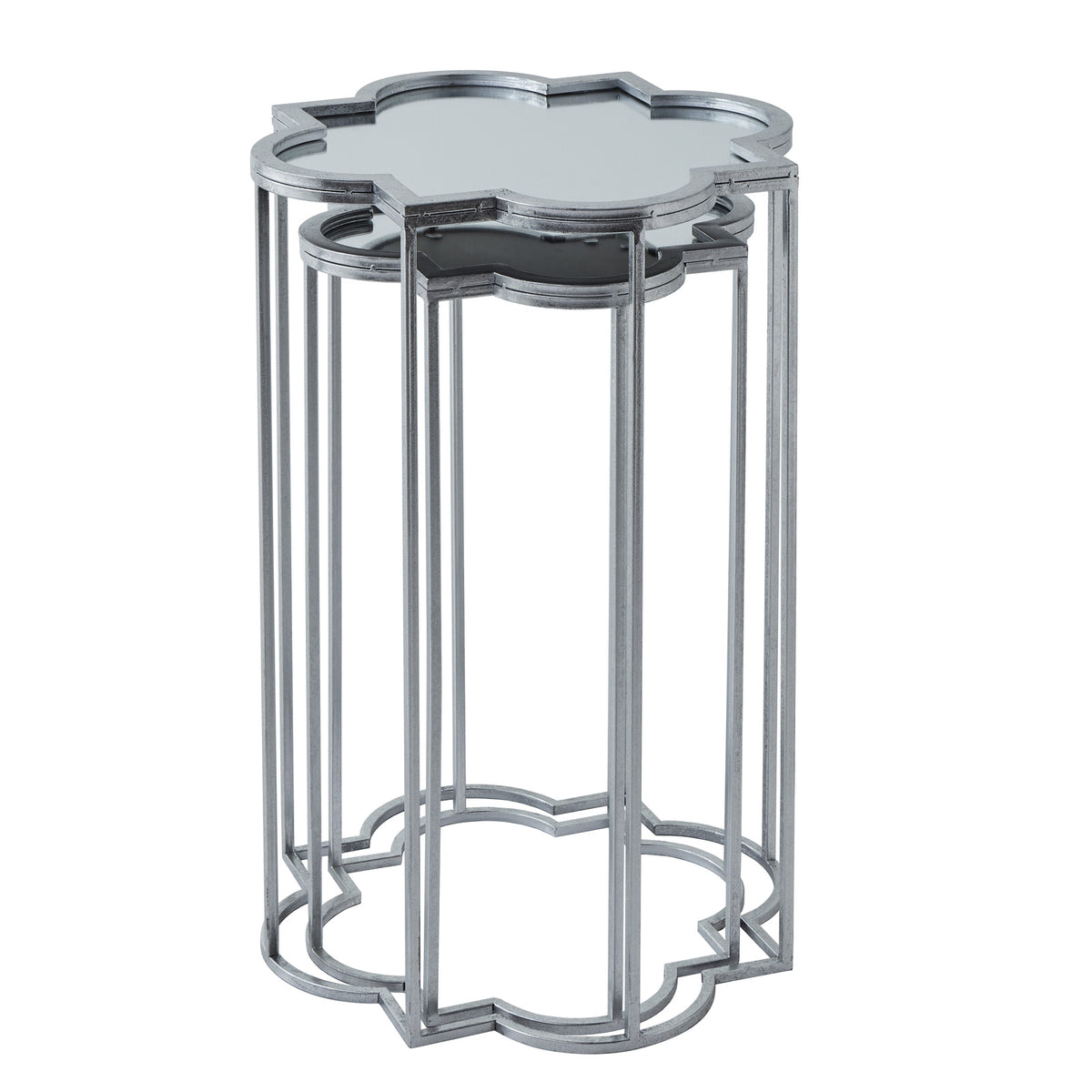 Smaller shaped-top side table positioned beneath the larger table, showing the overlapping straight legs and quatrefoil-like base frames.