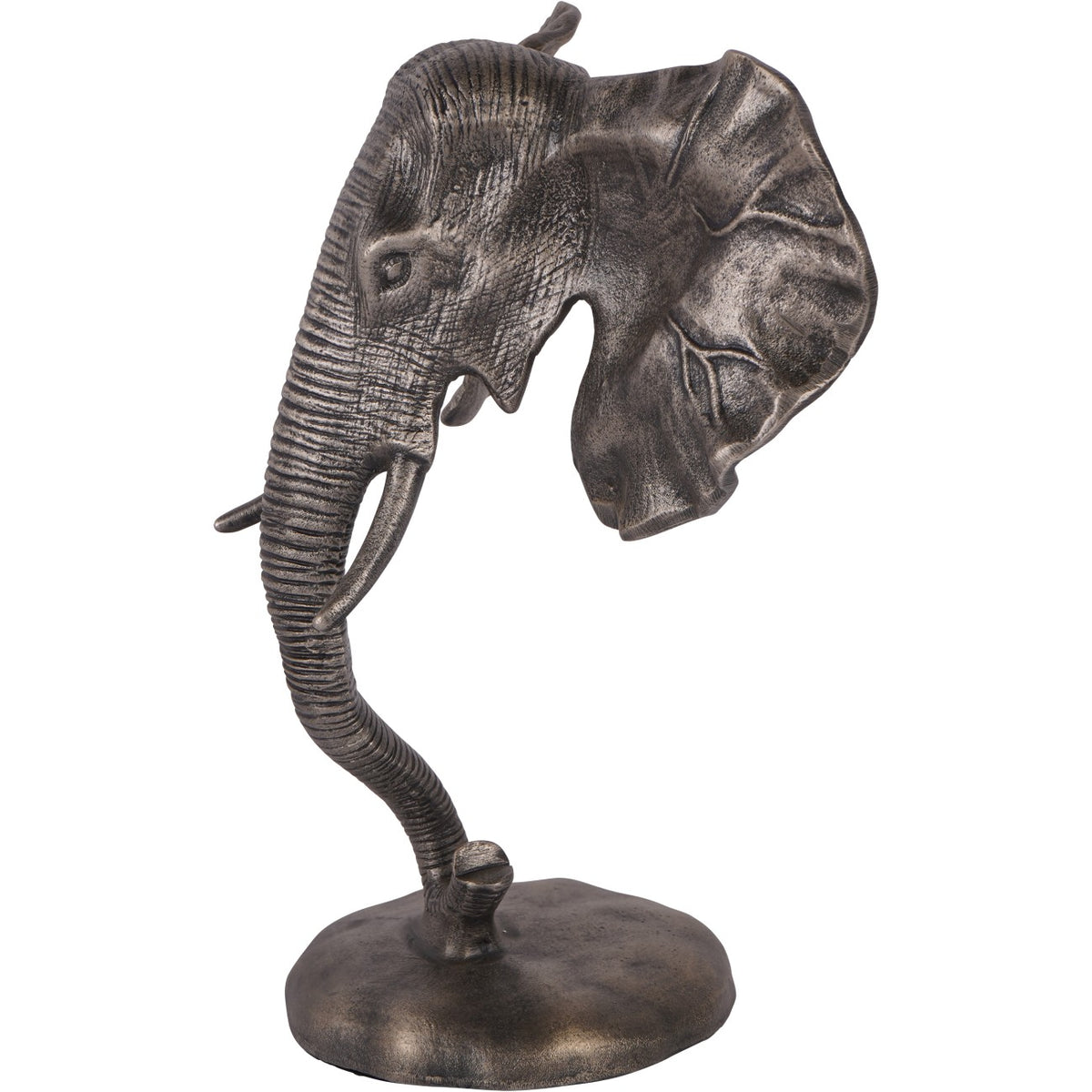 Angled view of the elephant sculpture showing the modelled eye, projecting tusks and sweeping curve of the trunk.