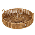 Warm brown round tray viewed from above at an angle, showing the radial open weave, looped sides and two raised handles.
