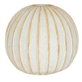 Cream-white decorative ball on a white background, with narrow tan grooves curving down its rounded sides.