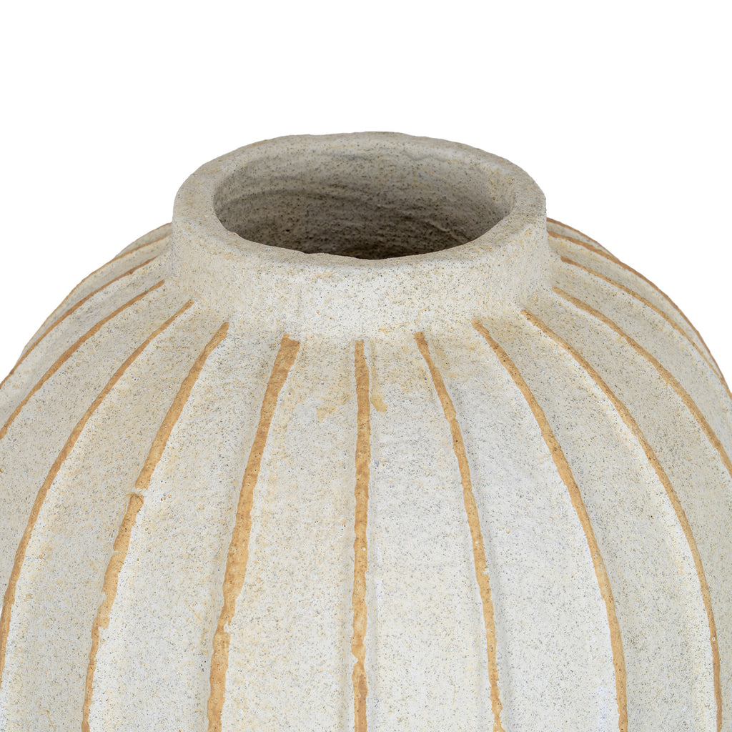 Close view of the vase opening and short neck, with tan grooves spreading across the rounded shoulders.