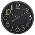 Round black wall clock with raised gold-toned Arabic numerals, matching slender hands and a dark rounded rim.