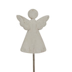Close-up of the angel figure showing scalloped wing edges and darker marks through the pale whitewashed finish.
