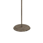 Detail of the angel ornament's slender stem and round stepped base with a dark mottled finish.