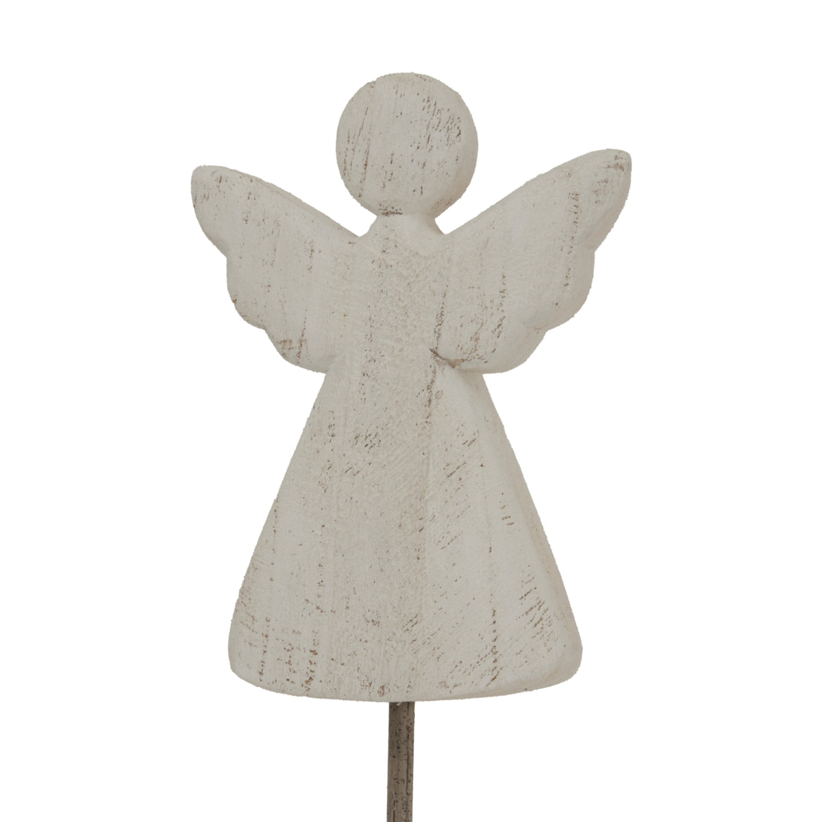 Close view of the angel's round head, scalloped wings and flared body, showing brown markings across the pale finish.