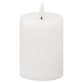 White cylindrical LED candle on a white background, with a smooth surface, rounded top edge and shallow recess holding an unlit white flame-shaped element on a short dark stem.