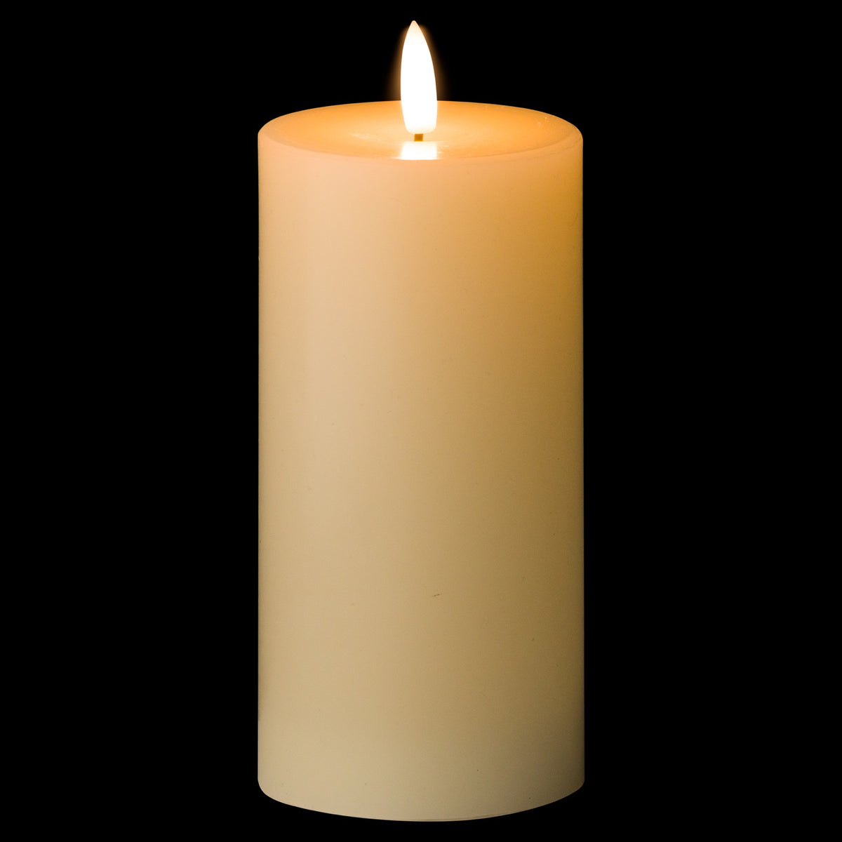 Ivory pillar LED candle against a black background, with a bright white flame-shaped element and an amber glow visible around the recessed top.