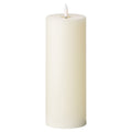 Tall ivory LED pillar candle against a white background, showing straight sides, a recessed top and a white flame-shaped element.