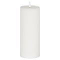 White cylindrical candle shown unlit against a white background, with a softly rounded top edge, shallow recess and white flame-shaped element on a short dark stem.