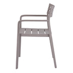 Side view of the grey dining chair showing its gently reclined back, long open arms and slightly splayed legs.